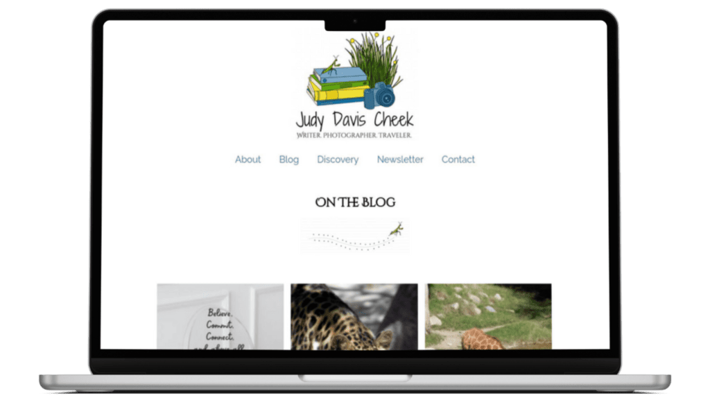 Macbook showing website for Judy Davis Cheek. Writer. Photographer. Traveler.