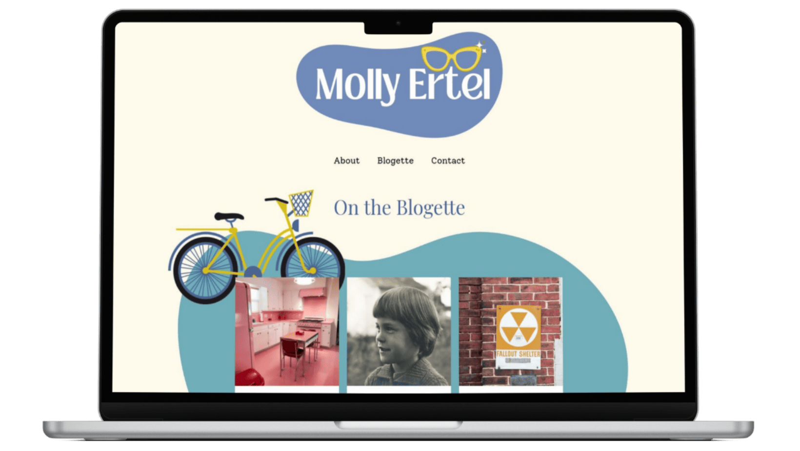 Macbook showing author website for Molly Ertel, Writer