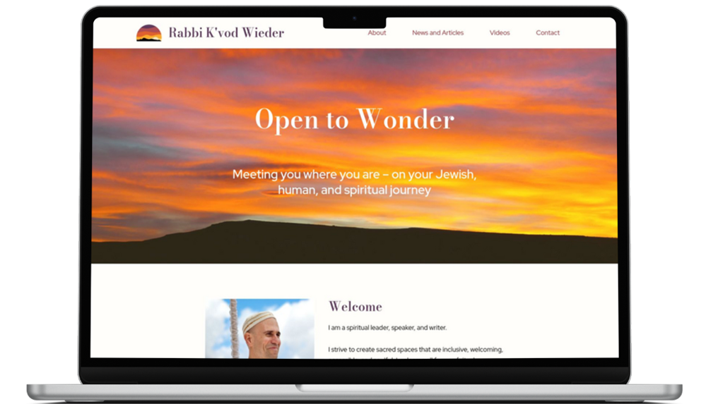 Macbook showing website Rabbo K'vod Wieder