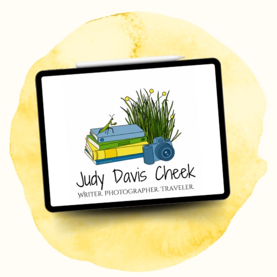 Author Logo sample on an ipad against background of yellow watercolor
